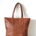 Regalo corporativo Cartera Tote con cierre de cuero Vakapi en D&A confecciones. Indumentaria de trabajo